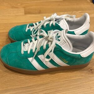 Green suede Adidas Gazelles